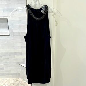 Elegant Black Sleeveless Jersey Blouse with Chain  Neckline Detail